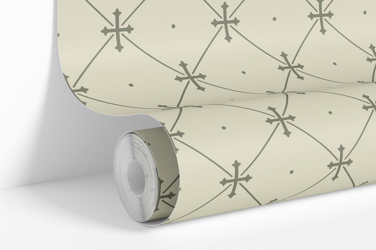 Beige colorway: Cloister Trellis wallpaper roll standing against a wall