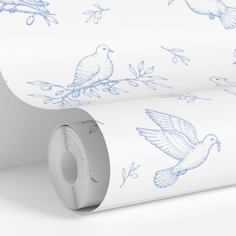 Blue colorway: Dove Toile wallpaper roll standing against a wall